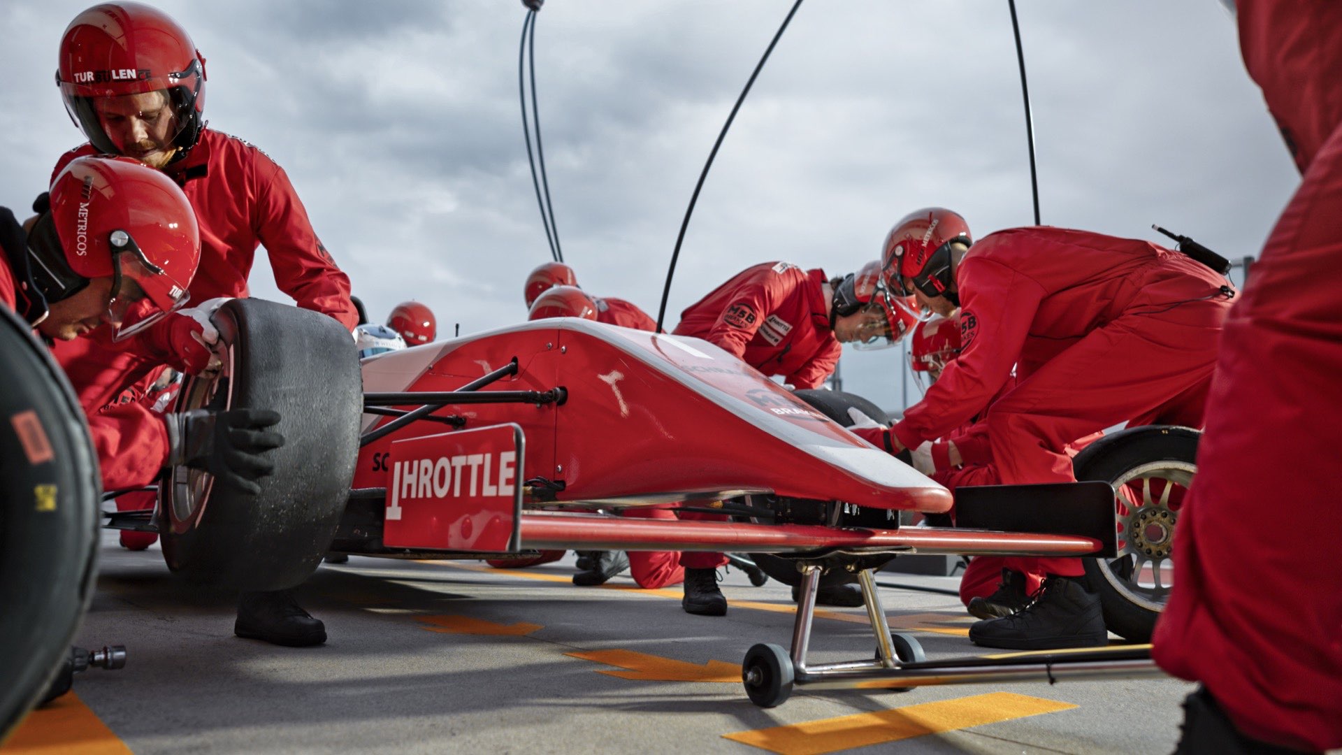 Climbers walking on a snowy ridge